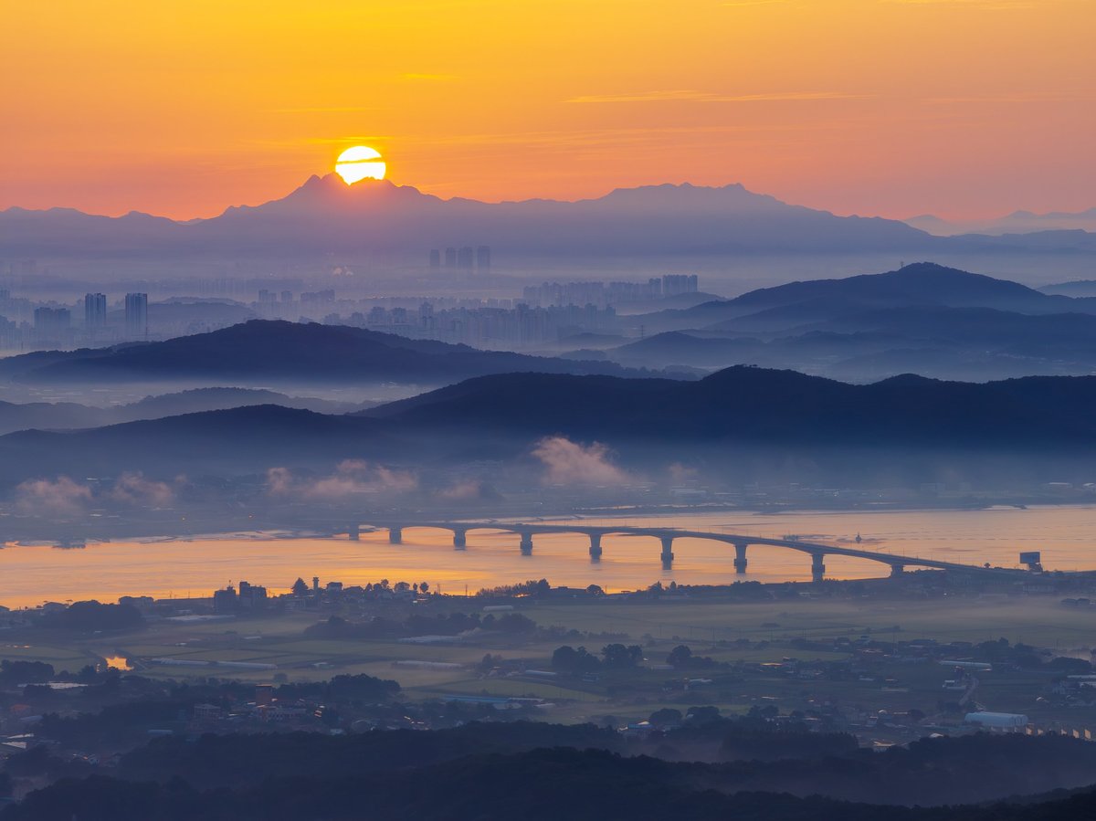 Sunrise over a quiet mountain ridge